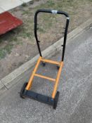 An adjustable metal trolley