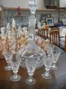 A cut glass decanter and six sherry glasses. COLLECT ONLY.
