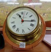 A mid 20th century ships battery clock