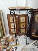 A painted top metal frame pot stand