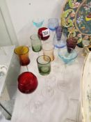 12 good mid 20th century coloured glass long stems