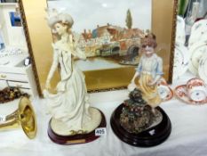 2 lady figures on wooden bases 1 from the Juliana collection