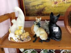 A collection of cat ornaments