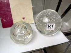 A large glass paperweight & 1 other