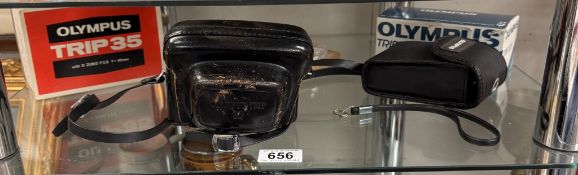 An Olympus Trip 35 & Olympus Trip 301 camera