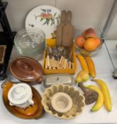 A good lot of vintage kitchenalia including butter pats, & stoneware jelly mould etc