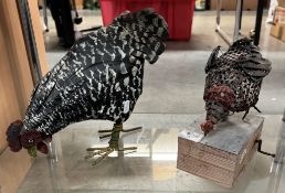 A painted metal chicken & 1 other