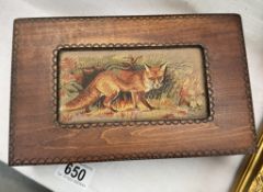 A Cash's woven picture of a fox mounted into a wooden box. From the Tatra mountains, Poland