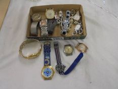 A quantity of ladies and gents wrist watches.