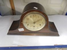 An oak Napoleon hat mantel clock. COLLECT ONLY.