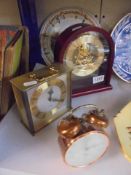 Three mantle clocks.