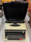 A cased Brother vintage typewriter COLLECT ONLY