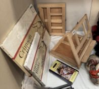 A quantity of artist easels, canvas etc