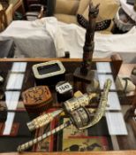 A small miscellaneous lot of native souveniers including Canadian Totum, Himalayan prayer sticks &