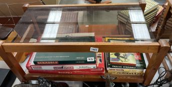 A retro glass topped coffee table on casters COLLECT ONLY