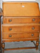 A mid 20th century oak bureau, COLLECT ONLY.