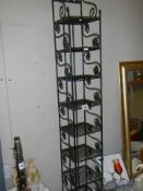 An eight shelf book/DVD stand, COLLECT ONLY.