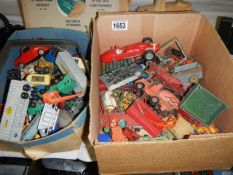 A good lot of play worn die cast cars etc., in two trays.