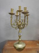 A heavy brass candelabra.