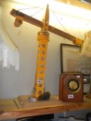 An old wooden toy crane.