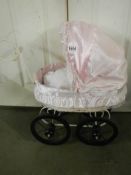 A late 20th century replica dolls pram with doll. COLLECT ONLY.