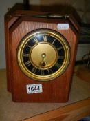 A 1920's oak mantel clock.