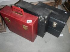 Four vintage LP record cases.