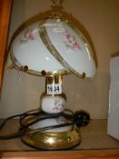 A modern floral decorated table lamp.