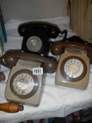Three old telephones.