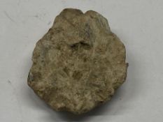 An early lead object engraved with head