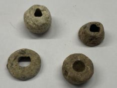 4 lead fishing weights, 2 of which are decorated