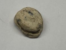 A small button Roman Curse Purse