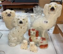 A pair of Royal Doulton Staffordshire dogs & 4 odd dogs
