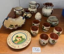 A selection of Torquay ware including puzzle jug & set of 6 Ilfracombe egg cups etc.