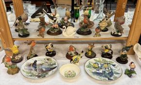 A good collection of bird ornaments & plates including Goebel swan & Poole robin dish etc.
