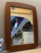 A retro teak framed mirror