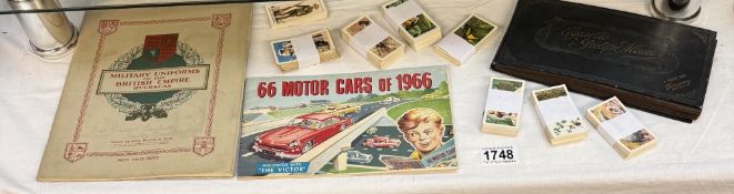 A quantity of cigarette & collectors cards