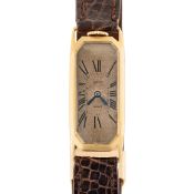 A VERY RARE 18K SOLID GOLD RECTANGULAR CARTIER PARIS TOP WIND WRIST WATCH CIRCA 1920s Movement: 19J,