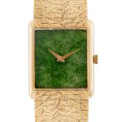 A LADY'S FINE 18K SOLID GOLD PIAGET BRACELET WATCH CIRCA 1970s, REF. 9287 WITH JADE STONE DIAL