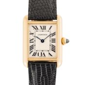 A LADY'S 18K SOLID GOLD CARTIER TANK LOUIS WRIST WATCH CIRCA 2000s, REF. 2442 WITH CARTIER SERVICE