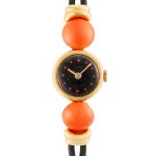 A LADY'S 18K SOLID GOLD UNIVERSAL GENEVE COCKTAIL WATCH CIRCA 1937, RETAILED BY ASPREY Movement: