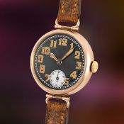 A RARE GENTLEMAN'S SIZE 9CT SOLID GOLD ROLEX OFFICER'S WRIST WATCH CIRCA 1915, BLACK ENAMEL DIAL