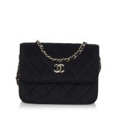 Chanel Matelasse Velvet Pearl Crush Flap Bag The Mini Flap Bag features a quilted velvet body, a