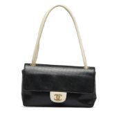 Chanel Medium Peforated Lambskin Single Flap This shoulder bag features a perforated lambskin
