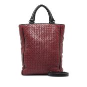 Bottega Veneta Intrecciato Satchel This satchel features a woven leather body, rolled leather