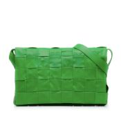 Bottega Veneta Maxi Intrecciato Cassette Crossbody Bag The Cassette features a woven leather body, a