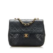 Chanel Mini Classic Lambskin Square Flap The Square Flap features a lambskin leather body, a leather
