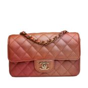 Chanel Mini Classic Lambskin Rectangular Single Flap This flap bag features an iridescent ombre