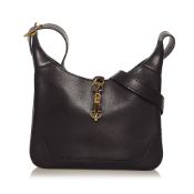 Hermes Trim Duo Leather Crossbody Bag The Trim Duo 24 crossbody bag features a leather body, an