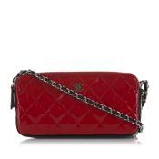 Chanel Bicolor Patent Double Zip Wallet on Chain This wallet on chain features a quilted patent